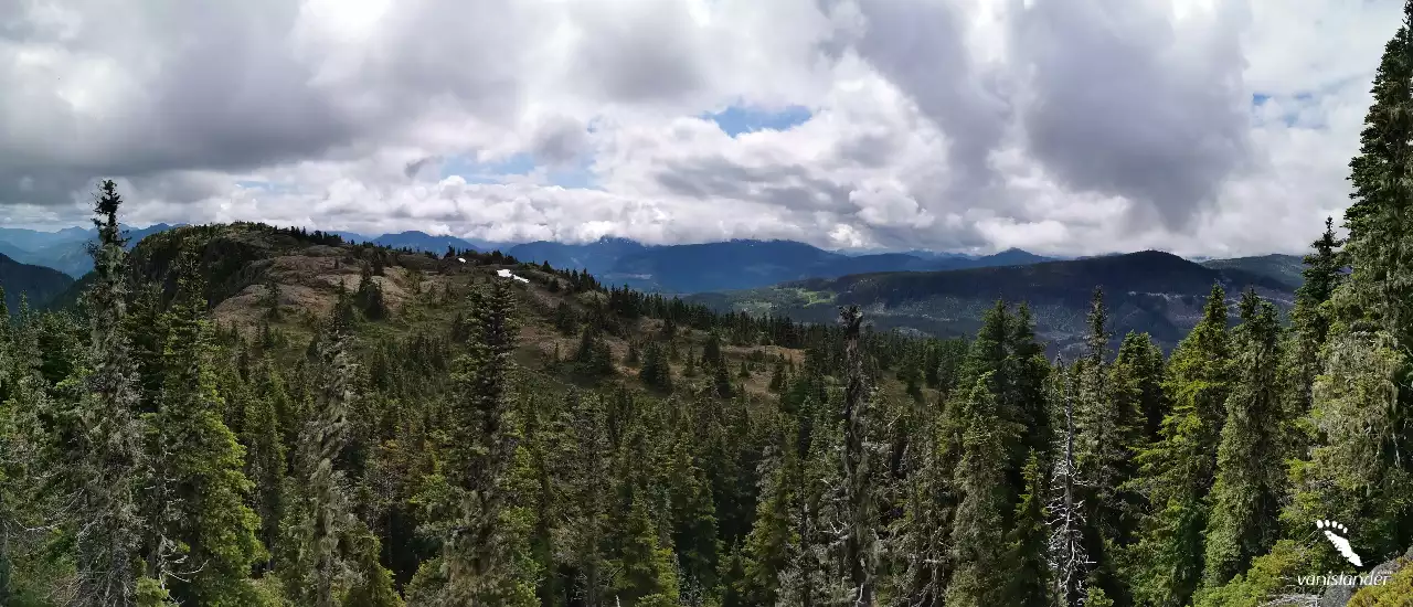 Wide view of the trees, clouds and Mountains from Mount Moriarty & Labour Day Lake - Port Alberni,  Vancouver Island